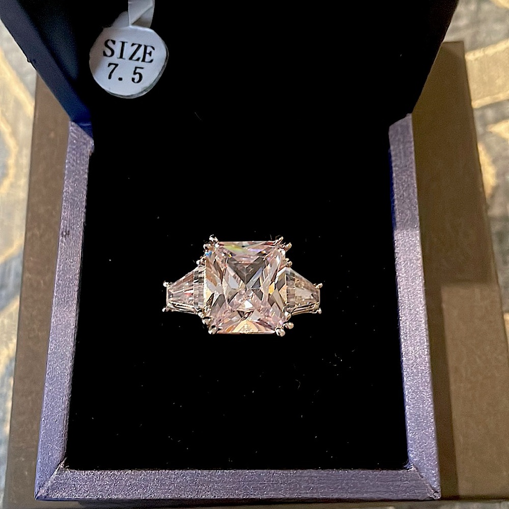 3 stone cubic ring. 5 kt cry  one carat on side pretty fun  SWETELOVE Jewelry